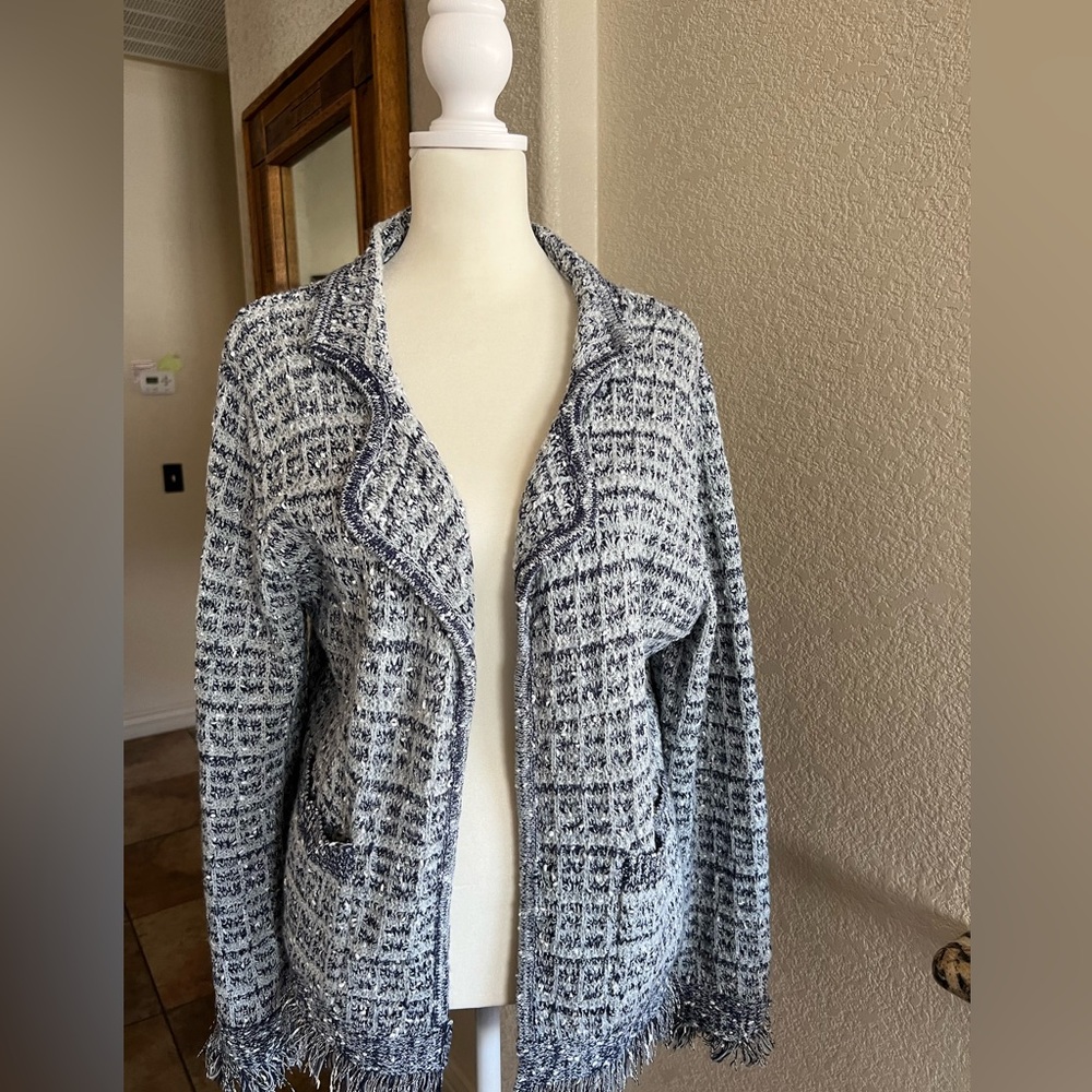 LIKE NEW Sioni size medium blue/white colored open front sweater with pockets.